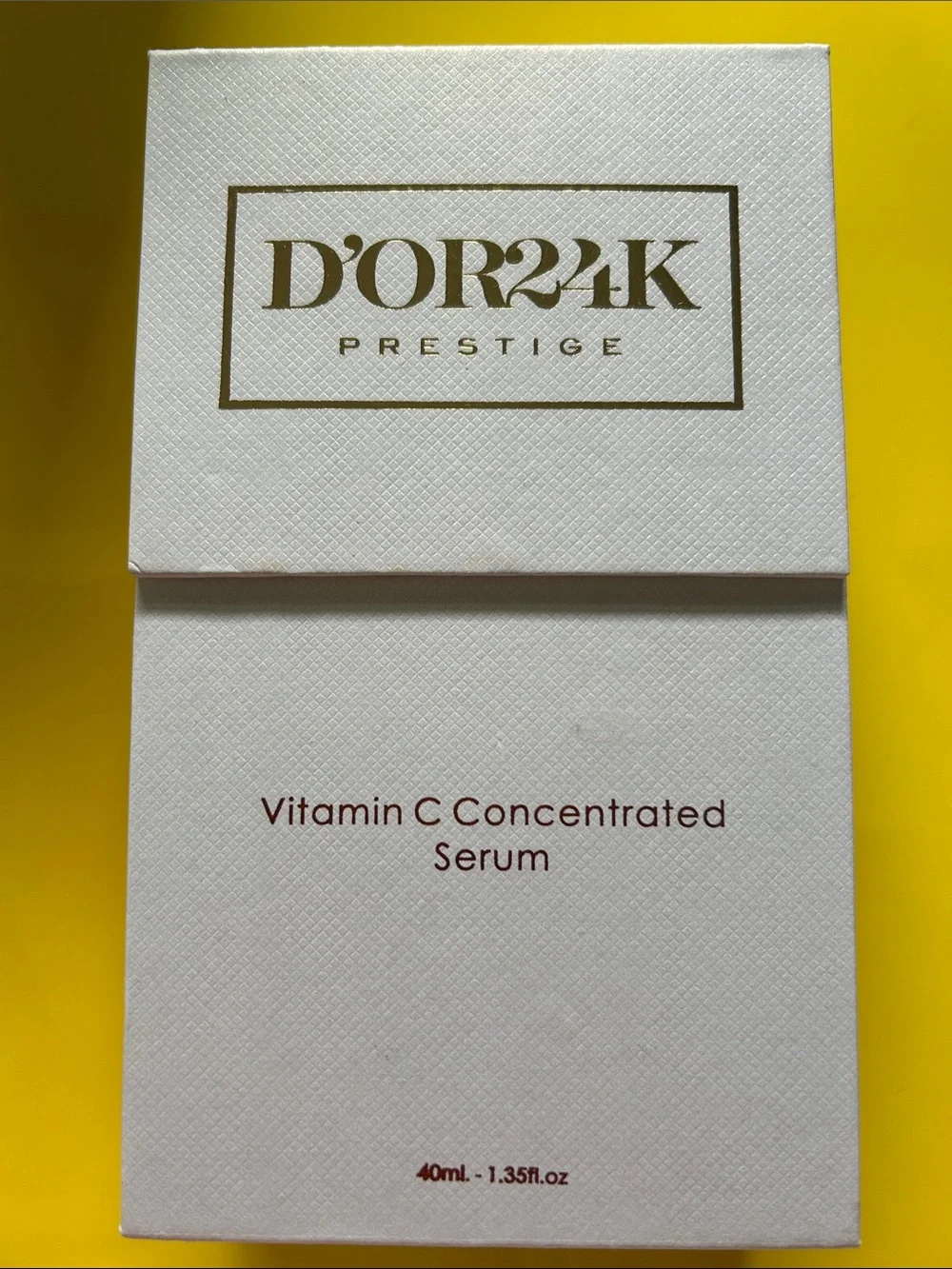 D'Or Skincare moisturizer set in cream, white and yellow packaging